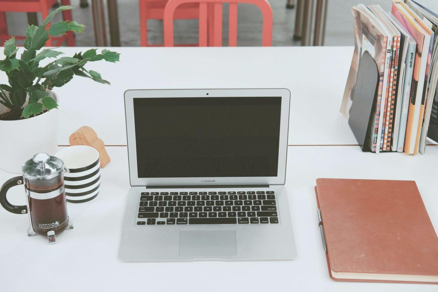 Students working together on investment analysis during workshop session